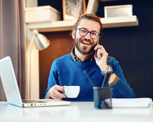 business man talking on phone to switch email providers for digital marketers